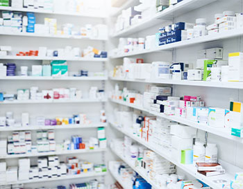 Pharmacy, pills and box with healthcare store, shelf and prescription care medicine. Medical, retail shop and supply of health supplements, vitamins and minerals for vitality and wellness dispensary